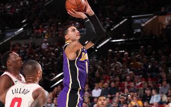 PORTLAND, OR - DECEMBER 28: Kyle Kuzma #0 of the Los Angeles Lakers shoots the ball against the Portland Trail Blazers on December 28, 2019 at the Moda Center Arena in Portland, Oregon. NOTE TO USER: User expressly acknowledges and agrees that, by downloading and or using this photograph, user is consenting to the terms and conditions of the Getty Images License Agreement. Mandatory Copyright Notice: Copyright 2019 NBAE (Photo by Cameron Browne/NBAE via Getty Images)