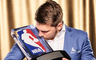 SANTA MONICA, CA - JUNE 24: Luka Doncic #77 of the Dallas Mavericks poses for a portrait after winning the NBA Rookie of the Year Award during the 2019 NBA Awards Show at the Barker Hangar on June 24, 2019 in Santa Monica, California. NOTE TO USER: User expressly acknowledges and agrees that, by downloading and/or using this Photograph, user is consenting to the terms and conditions of the Getty Images License Agreement. Mandatory Copyright Notice: Copyright 2019 NBAE (Photo by Jennifer Pottheiser/NBAE via Getty Images)