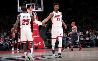 WASHINGTON, DC -  DECEMBER 30: Kendrick Nunn #25, and Jimmy Butler #22 of the Miami Heat hi-five each other during the game against the Washington Wizards on December 30, 2019 at Capital One Arena in Washington, DC. NOTE TO USER: User expressly acknowledges and agrees that, by downloading and or using this Photograph, user is consenting to the terms and conditions of the Getty Images License Agreement. Mandatory Copyright Notice: Copyright 2019 NBAE (Photo by Ned Dishman/NBAE via Getty Images)
