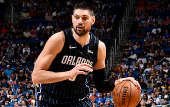 ORLANDO, FL - DECEMBER 30: Nikola Vucevic #9 of the Orlando Magic handles the ball against the Atlanta Hawks on December 30, 2019 at Amway Center in Orlando, Florida. NOTE TO USER: User expressly acknowledges and agrees that, by downloading and or using this photograph, User is consenting to the terms and conditions of the Getty Images License Agreement. Mandatory Copyright Notice: Copyright 2019 NBAE (Photo by Fernando Medina/NBAE via Getty Images)