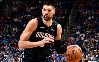 ORLANDO, FL - DECEMBER 30: Nikola Vucevic #9 of the Orlando Magic handles the ball against the Atlanta Hawks on December 30, 2019 at Amway Center in Orlando, Florida. NOTE TO USER: User expressly acknowledges and agrees that, by downloading and or using this photograph, User is consenting to the terms and conditions of the Getty Images License Agreement. Mandatory Copyright Notice: Copyright 2019 NBAE (Photo by Fernando Medina/NBAE via Getty Images)