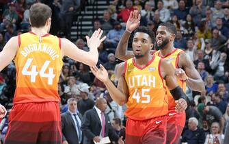 SALT LAKE CITY, UT - DECEMBER 30: Bojan Bogdanovic #44, and Donovan Mitchell #45 of the Utah Jazz hi-five each other during the game against the Detroit Pistons on December 30, 2019 at Vivint Smart Home Arena in Salt Lake City, Utah. NOTE TO USER: User expressly acknowledges and agrees that, by downloading and or using this Photograph, User is consenting to the terms and conditions of the Getty Images License Agreement. Mandatory Copyright Notice: Copyright 2019 NBAE (Photo by Melissa Majchrzak/NBAE via Getty Images)