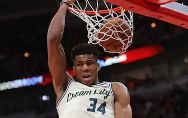 CHICAGO, ILLINOIS - DECEMBER 30: Giannis Antetokounmpo #34 of the Milwaukee Bucks slams a reverse dunk against the Chicago Bulls at the United Center on December 30, 2019 in Chicago, Illinois. The Bucks defeated the Bulls 123-102. NOTE TO USER: User expressly acknowledges and agrees that , by downloading and or using this photograph, User is consenting to the terms and conditions of the Getty Images License Agreement. (Photo by Jonathan Daniel/Getty Images)
