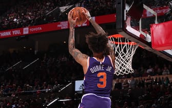 PORTLAND, OR - DECEMBER 30: Kelly Oubre Jr. #3 of the Phoenix Suns dunks the ball against the Portland Trail Blazers on December 30, 2019 at the Moda Center Arena in Portland, Oregon. NOTE TO USER: User expressly acknowledges and agrees that, by downloading and or using this photograph, user is consenting to the terms and conditions of the Getty Images License Agreement. Mandatory Copyright Notice: Copyright 2019 NBAE (Photo by Cameron Browne/NBAE via Getty Images)