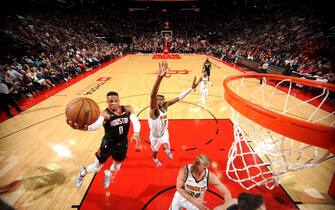 HOUSTON, TX - DECEMBER 31 : Russell Westbrook #0 of the Houston Rockets drives to the basket during a game against the Denver Nuggets on December 31, 2019 at the Toyota Center in Houston, Texas. NOTE TO USER: User expressly acknowledges and agrees that, by downloading and or using this photograph, User is consenting to the terms and conditions of the Getty Images License Agreement. Mandatory Copyright Notice: Copyright 2019 NBAE (Photo by Bill Baptist/NBAE via Getty Images)