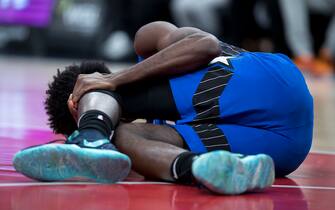 WASHINGTON, DC - JANUARY 01: Jonathan Isaac #1 of the Orlando Magic is injured against the Washington Wizards during the first half at Capital One Arena on January 1, 2020 in Washington, DC. NOTE TO USER: User expressly acknowledges and agrees that, by downloading and or using this photograph, User is consenting to the terms and conditions of the Getty Images License Agreement. (Photo by Scott Taetsch/Getty Images)