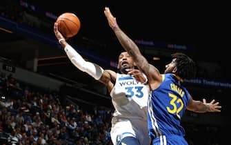 MINNEAPOLIS, MN -  JANUARY 2: Robert Covington #33 of the Minnesota Timberwolves drives to the basket during a game against the Golden State Warriors on January 2, 2020 at Target Center in Minneapolis, Minnesota. NOTE TO USER: User expressly acknowledges and agrees that, by downloading and or using this Photograph, user is consenting to the terms and conditions of the Getty Images License Agreement. Mandatory Copyright Notice: Copyright 2020 NBAE (Photo by David Sherman/NBAE via Getty Images)