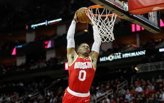 HOUSTON, TX - JANUARY 03:  Russell Westbrook #0 of the Houston Rockets goes up for a dunk in the second half against the Philadelphia 76ers at Toyota Center on January 3, 2020 in Houston, Texas.  NOTE TO USER: User expressly acknowledges and agrees that, by downloading and or using this photograph, User is consenting to the terms and conditions of the Getty Images License Agreement.  (Photo by Tim Warner/Getty Images)