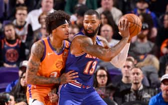 PHOENIX, AZ - JANUARY 3: Marcus Morris Sr. #13 of the New York Knicks handles the ball against the Phoenix Suns on January 3, 2020 at Talking Stick Resort Arena in Phoenix, Arizona. NOTE TO USER: User expressly acknowledges and agrees that, by downloading and or using this photograph, user is consenting to the terms and conditions of the Getty Images License Agreement. Mandatory Copyright Notice: Copyright 2020 NBAE (Photo by Barry Gossage/NBAE via Getty Images)