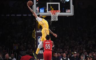 LOS ANGELES, CA - JANUARY 03: Anthony Davis #3 of the Los Angeles Lakers dunk against E'Twaun Moore #55 of the New Orleans Pelicans during the first half of the basketball game at Staples Center on January 3, 2020 in Los Angeles, California. NOTE TO USER: User expressly acknowledges and agrees that, by downloading and or using this Photograph, user is consenting to the terms and conditions of the Getty Images License Agreement. (Photo by Kevork Djansezian/Getty Images)