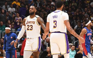 LOS ANGELES, CA - JANUARY 5: LeBron James #23 and Anthony Davis #3 of the Los Angeles Lakers hi-five during the game against the Detroit Pistons on January 5, 2020 at STAPLES Center in Los Angeles, California. NOTE TO USER: User expressly acknowledges and agrees that, by downloading and/or using this Photograph, user is consenting to the terms and conditions of the Getty Images License Agreement. Mandatory Copyright Notice: Copyright 2020 NBAE (Photo by Andrew D. Bernstein/NBAE via Getty Images)