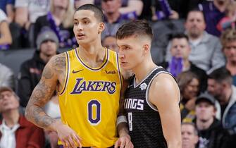 SACRAMENTO, CA - DECEMBER 27: Kyle Kuzma #0 of the Los Angeles Lakers faces off against Bogdan Bogdanovic #8 of the Sacramento Kings on December 27, 2018 at Golden 1 Center in Sacramento, California. NOTE TO USER: User expressly acknowledges and agrees that, by downloading and or using this photograph, User is consenting to the terms and conditions of the Getty Images Agreement. Mandatory Copyright Notice: Copyright 2018 NBAE (Photo by Rocky Widner/NBAE via Getty Images)