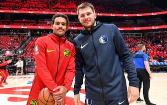 ATLANTA, GA - OCTOBER 24: Trae Young #11 of the Atlanta Hawks and Luka Doncic #77 of the Dallas Mavericks pose for a photo before the game on October 24, 2018 at State Farm Arena in Atlanta, Georgia. NOTE TO USER: User expressly acknowledges and agrees that, by downloading and/or using this photograph, user is consenting to the terms and conditions of the Getty Images License Agreement. Mandatory Copyright Notice: Copyright 2018 NBAE (Photo by Scott Cunningham/NBAE via Getty Images)