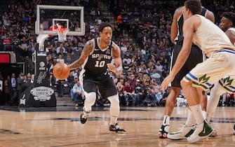 1192335237 SAN ANTONIO, TX - JANUARY 6: DeMar DeRozan #10 of the San Antonio Spurs handles the ball against the Milwaukee Bucks on January 6, 2020 at the AT&T Center in San Antonio, Texas. NOTE TO USER: User expressly acknowledges and agrees that, by downloading and or using this photograph, user is consenting to the terms and conditions of the Getty Images License Agreement. Mandatory Copyright Notice: Copyright 2020 NBAE (Photos by Darren Carroll/NBAE via Getty Images)