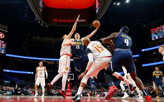ATLANTA, GA - JANUARY 06: Nikola Jokic #15 of the Denver Nuggets attempts a layup during the second half of an NBA game against the Atlanta Hawks at State Farm Arena on January 6, 2020 in Atlanta, Georgia. NOTE TO USER: User expressly acknowledges and agrees that, by downloading and/or using this photograph, user is consenting to the terms and conditions of the Getty Images License Agreement. (Photo by Todd Kirkland/Getty Images)