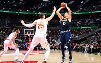 1192335028 ATLANTA, GA - JANUARY 6: Nikola Jokic #15 of the Denver Nuggets shoots the ball against the Atlanta Hawks on January 6, 2020 at State Farm Arena in Atlanta, Georgia. NOTE TO USER: User expressly acknowledges and agrees that, by downloading and/or using this Photograph, user is consenting to the terms and conditions of the Getty Images License Agreement. Mandatory Copyright Notice: Copyright 2020 NBAE (Photo by Scott Cunningham/NBAE via Getty Images)