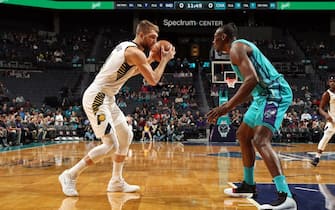 CHARLOTTE, NC - JANUARY 6: Domantas Sabonis #11 of the Indiana Pacers handles the ball during the game against the Charlotte Hornets on January 6, 2020 at Spectrum Center in Charlotte, North Carolina. NOTE TO USER: User expressly acknowledges and agrees that, by downloading and or using this photograph, User is consenting to the terms and conditions of the Getty Images License Agreement.  Mandatory Copyright Notice:  Copyright 2020 NBAE (Photo by Brock Williams-Smith/NBAE via Getty Images)