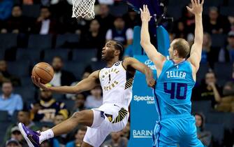 CHARLOTTE, NORTH CAROLINA - JANUARY 06: T.J. Warren #1 of the Indiana Pacers drives to the basket against Cody Zeller #40 of the Charlotte Hornets during their game at Spectrum Center on January 06, 2020 in Charlotte, North Carolina. NOTE TO USER: User expressly acknowledges and agrees that, by downloading and or using this photograph, User is consenting to the terms and conditions of the Getty Images License Agreement. (Photo by Streeter Lecka/Getty Images)