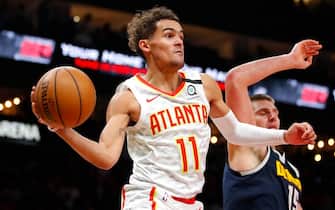 ATLANTA, GA - JANUARY 06: Trae Young #11 of the Atlanta Hawks passes during the second half of an NBA game against the Denver Nuggets at State Farm Arena on January 6, 2020 in Atlanta, Georgia. NOTE TO USER: User expressly acknowledges and agrees that, by downloading and/or using this photograph, user is consenting to the terms and conditions of the Getty Images License Agreement. (Photo by Todd Kirkland/Getty Images)