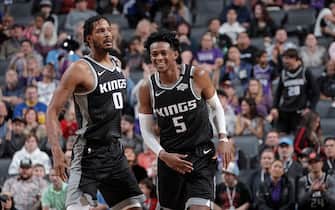 SACRAMENTO, CA - JANUARY 6: De'Aaron Fox #5 of the Sacramento Kings smiles during a game against the Golden State Warriors on January 6, 2020 at Golden 1 Center in Sacramento, California. NOTE TO USER: User expressly acknowledges and agrees that, by downloading and or using this Photograph, user is consenting to the terms and conditions of the Getty Images License Agreement. Mandatory Copyright Notice: Copyright 2020 NBAE (Photo by Rocky Widner/NBAE via Getty Images)