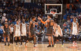 ORLANDO, FL - JANUARY 6: Markelle Fultz #20, and Aaron Gordon #00 of the Orlando Magic hi-five each other during the game against the Brooklyn Nets on January 6, 2020 at Amway Center in Orlando, Florida. NOTE TO USER: User expressly acknowledges and agrees that, by downloading and or using this photograph, User is consenting to the terms and conditions of the Getty Images License Agreement. Mandatory Copyright Notice: Copyright 2020 NBAE (Photo by Gary Bassing/NBAE via Getty Images)