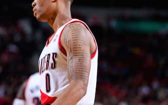 PORTLAND, OR - DECEMBER 16: A close-up of the tattoo of Damian Lillard #0 of the Portland Trail Blazers during a game against the New Orleans Hornets on December 16, 2012 at the Rose Garden Arena in Portland, Oregon. NOTE TO USER: User expressly acknowledges and agrees that, by downloading and or using this photograph, user is consenting to the terms and conditions of the Getty Images License Agreement. Mandatory Copyright Notice: Copyright 2012 NBAE (Photo by Sam Forencich/NBAE via Getty Images)