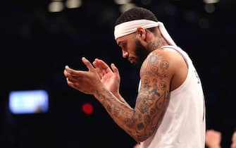 NEW YORK, NEW YORK - APRIL 18: Mike Scott #1 of the Philadelphia 76ers reacts in the third quarter against the Brooklyn Nets during game three of Round One of the 2019 NBA Playoffs at Barclays Center on April 18, 2019 in the Brooklyn borough of New York City. NOTE TO USER: User expressly acknowledges and agrees that, by downloading and or using this photograph, User is consenting to the terms and conditions of the Getty Images License Agreement. (Photo by Elsa/Getty Images)