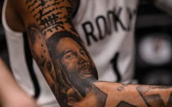 MIAMI, FL - MARCH 02: A detailed view of the tattoos of D'Angelo Russell #1 of the Brooklyn Nets in action against the Miami Heat at American Airlines Arena on March 2, 2019 in Miami, Florida. NOTE TO USER: User expressly acknowledges and agrees that, by downloading and or using this photograph, User is consenting to the terms and conditions of the Getty Images License Agreement. (Photo by Mark Brown/Getty Images)