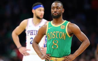 BOSTON, MASSACHUSETTS - DECEMBER 12: Kemba Walker #8 of the Boston Celtics looks on during the game against the Philadelphia 76ers at TD Garden on December 12, 2019 in Boston, Massachusetts.  The 76ers defeat the Celtics 115-109. NOTE TO USER: User expressly acknowledges and agrees that, by downloading and or using this photograph, User is consenting to the terms and conditions of the Getty Images License Agreement.  (Photo by Maddie Meyer/Getty Images)