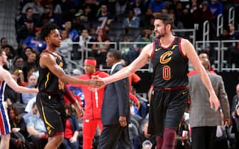 DETROIT, MI - JANUARY 9: Darius Garland #10 of the Cleveland Cavaliers high fives teammate Kevin Love #0 of the Cleveland Cavaliers during a game against the Detroit Pistons on January 9, 2019 at Little Caesars Arena in Detroit, Michigan. NOTE TO USER: User expressly acknowledges and agrees that, by downloading and/or using this photograph, User is consenting to the terms and conditions of the Getty Images License Agreement. Mandatory Copyright Notice: Copyright 2019 NBAE (Photo by Brian Sevald/NBAE via Getty Images)