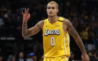 DALLAS, TEXAS - JANUARY 10:   Kyle Kuzma #0 of the Los Angeles Lakers reacts after making a three-point shot against the Dallas Mavericks at American Airlines Center on January 10, 2020 in Dallas, Texas.  NOTE TO USER: User expressly acknowledges and agrees that, by downloading and or using this photograph, User is consenting to the terms and conditions of the Getty Images License Agreement.  (Photo by Ronald Martinez/Getty Images)