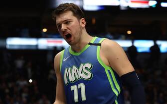 DALLAS, TEXAS - JANUARY 10:   Luka Doncic #77 of the Dallas Mavericks reacts during play against the Los Angeles Lakers at American Airlines Center on January 10, 2020 in Dallas, Texas.  NOTE TO USER: User expressly acknowledges and agrees that, by downloading and or using this photograph, User is consenting to the terms and conditions of the Getty Images License Agreement.  (Photo by Ronald Martinez/Getty Images)
