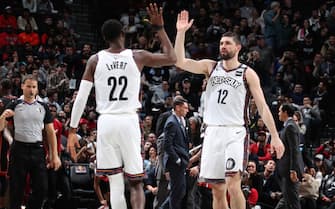 NEW YORK, NY - JANUARY 10: Caris LeVert #22 and Joe Harris #12 of the Brooklyn Nets high five each other during the game against the Miami Heat on January 10, 2020 at Madison Square Garden in New York City, New York.  NOTE TO USER: User expressly acknowledges and agrees that, by downloading and or using this photograph, User is consenting to the terms and conditions of the Getty Images License Agreement. Mandatory Copyright Notice: Copyright 2020 NBAE  (Photo by Nathaniel S. Butler/NBAE via Getty Images)