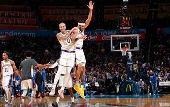 1193183377 OKLAHOMA CITY, OK - JANUARY 11: JaVale McGee #7 of the Los Angeles Lakers and Kyle Kuzma #0 of the Los Angeles Lakers reacts to play against the Oklahoma City Thunder on January 11, 2020 at Chesapeake Energy Arena in Oklahoma City, Oklahoma. NOTE TO USER: User expressly acknowledges and agrees that, by downloading and or using this photograph, User is consenting to the terms and conditions of the Getty Images License Agreement. Mandatory Copyright Notice: Copyright 2020 NBAE (Photo by Jeff Haynes/NBAE via Getty Images)