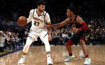 DENVER, COLORADO - JANUARY 11: Jamal Murray #27 of the Denver Nuggets drives against Darius Garland #10 of the Cleveland Cavaliers in the second quarter at the Pepsi Center on January 11, 2020 in Denver, Colorado. NOTE TO USER: User expressly acknowledges and agrees that, by downloading and or using this photograph, User is consenting to the terms and conditions of the Getty Images License Agreement. (Photo by Matthew Stockman/Getty Images)