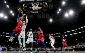 BOSTON, MASSACHUSETTS - DECEMBER 20: Derrick Rose #25 of the Detroit Pistons takes a shot against Enes Kanter #11 of the Boston Celtics  at TD Garden on December 20, 2019 in Boston, Massachusetts. The Celtics defeat the Pistons 114-93. NOTE TO USER: User expressly acknowledges and agrees that, by downloading and or using this photograph, User is consenting to the terms and conditions of the Getty Images License Agreement. (Photo by Maddie Meyer/Getty Images)