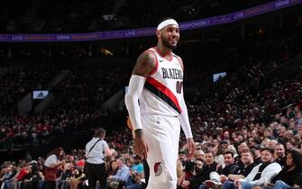 PORTLAND, OR - JANUARY 13: Carmelo Anthony #00 of the Portland Trail Blazers smiles against the Charlotte Hornets on January 13, 2020 at the Moda Center Arena in Portland, Oregon. NOTE TO USER: User expressly acknowledges and agrees that, by downloading and or using this photograph, user is consenting to the terms and conditions of the Getty Images License Agreement. Mandatory Copyright Notice: Copyright 2020 NBAE (Photo by Sam Forencich/NBAE via Getty Images)