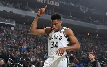 MILWAUKEE, WI - JANUARY 14: Giannis Antetokounmpo #34 of the Milwaukee Bucks looks on before the game against the New York Knicks on January 14, 2020 at the Fiserv Forum Center in Milwaukee, Wisconsin. NOTE TO USER: User expressly acknowledges and agrees that, by downloading and or using this Photograph, user is consenting to the terms and conditions of the Getty Images License Agreement. Mandatory Copyright Notice: Copyright 2020 NBAE (Photo by Gary Dineen/NBAE via Getty Images).