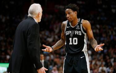 MIAMI, FLORIDA - JANUARY 15:  DeMar DeRozan #10 of the San Antonio Spurs reacts while talking with head coach Gregg Popovich against the Miami Heat during the second half at American Airlines Arena on January 15, 2020 in Miami, Florida. NOTE TO USER: User expressly acknowledges and agrees that, by downloading and/or using this photograph, user is consenting to the terms and conditions of the Getty Images License Agreement. (Photo by Michael Reaves/Getty Images)