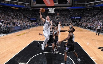 SACRAMENTO, CA - JANUARY 15: Luka Doncic #77 of the Dallas Mavericks shoots the ball against the Sacramento Kings on January 15, 2020 at Golden 1 Center in Sacramento, California. NOTE TO USER: User expressly acknowledges and agrees that, by downloading and or using this Photograph, user is consenting to the terms and conditions of the Getty Images License Agreement. Mandatory Copyright Notice: Copyright 2020 NBAE (Photo by Rocky Widner/NBAE via Getty Images)