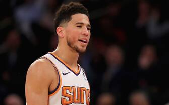 NEW YORK, NEW YORK - JANUARY 16:  Devin Booker #1 of the Phoenix Suns reacts after he is called for his fifth foul of the game against the New York Knicks at Madison Square Garden on January 16, 2020 in New York City.The Phoenix Suns defeated the New York Knicks 121-98.NOTE TO USER: User expressly acknowledges and agrees that, by downloading and or using this photograph, User is consenting to the terms and conditions of the Getty Images License Agreement. (Photo by Elsa/Getty Images)