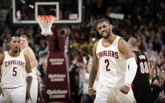 462437632 CLEVELAND, OH - JANUARY 28: Kyrie Irving #2 of the Cleveland Cavaliers celebrates during the game against the Portland Trail Blazers on January 28, 2015 at Quicken Loans Arena in Cleveland, Ohio. NOTE TO USER: User expressly acknowledges and agrees that, by downloading and/or using this Photograph, user is consenting to the terms and conditions of the Getty Images License Agreement. Mandatory Copyright Notice: Copyright 2015 NBAE (Photo by David Liam Kyle/NBAE via Getty Images)