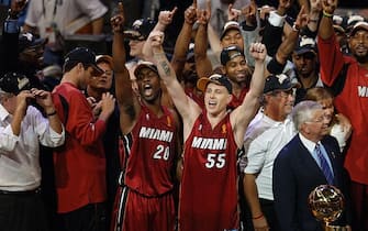 DALLAS - JUNE 20:  Gary Payton #20 and Jason Williams #55 of the Miami Heat celebrate after winning the NBA Championship in Game Six of the 2006 NBA Finals on June 20, 2006 at the American Airlines Center in Dallas, Texas. NOTE TO USER: User expressly acknowledges and agrees that, by downloading and/or using this Photograph, user is consenting to the terms and conditions of the Getty Images License Agreement. Mandatory Copyright Notice:  Copyright 2006 NBAE (Photo by Joe Murphy/NBAE via Getty Images)