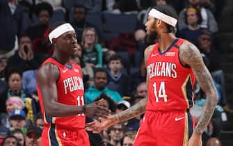 MEMPHIS, TN - JANUARY 20: Jrue Holiday #11 of the New Orleans Pelicans and Brandon Ingram #14 of the New Orleans Pelicans high-five during a game against the Memphis Grizzlies on January 20, 2020 at FedExForum in Memphis, Tennessee. NOTE TO USER: User expressly acknowledges and agrees that, by downloading and or using this photograph, User is consenting to the terms and conditions of the Getty Images License Agreement. Mandatory Copyright Notice: Copyright 2020 NBAE (Photo by Joe Murphy/NBAE via Getty Images)
