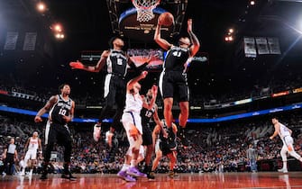 PHOENIX, AZ - JANUARY 20: Trey Lyles #41 of the San Antonio Spurs grabs the rebound against the Phoenix Suns on January 20, 2020 at Talking Stick Resort Arena in Phoenix, Arizona. NOTE TO USER: User expressly acknowledges and agrees that, by downloading and or using this photograph, user is consenting to the terms and conditions of the Getty Images License Agreement. Mandatory Copyright Notice: Copyright 2020 NBAE (Photo by Barry Gossage/NBAE via Getty Images)