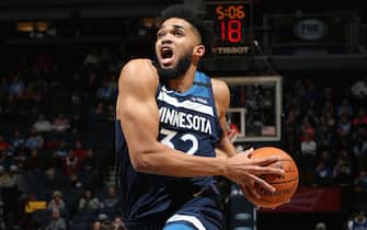 MINNEAPOLIS, MN -  JANUARY 20: Karl-Anthony Towns #32 of the Minnesota Timberwolves drives to the basket against the Denver Nuggets on January 20, 2020 at Target Center in Minneapolis, Minnesota. NOTE TO USER: User expressly acknowledges and agrees that, by downloading and or using this Photograph, user is consenting to the terms and conditions of the Getty Images License Agreement. Mandatory Copyright Notice: Copyright 2020 NBAE (Photo by David Sherman/NBAE via Getty Images)