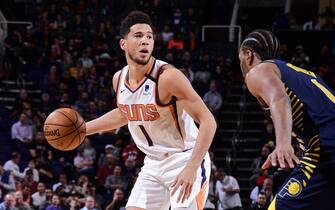 PHOENIX, AZ - JANUARY 22: Devin Booker #1 of the Phoenix Suns handles the ball against the San Antonio Spurs on January 22, 2020 at Talking Stick Resort Arena in Phoenix, Arizona. NOTE TO USER: User expressly acknowledges and agrees that, by downloading and or using this photograph, user is consenting to the terms and conditions of the Getty Images License Agreement. Mandatory Copyright Notice: Copyright 2020 NBAE (Photo by Michael Gonzales/NBAE via Getty Images)
