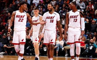 MIAMI, FL - JANUARY 22: Jimmy Butler #22, James Johnson #16, and Bam Adebayo #13 of the Miami Heat talk during the game against the Washington Wizards on January 22, 2020 at American Airlines Arena in Miami, Florida. NOTE TO USER: User expressly acknowledges and agrees that, by downloading and or using this Photograph, user is consenting to the terms and conditions of the Getty Images License Agreement. Mandatory Copyright Notice: Copyright 2020 NBAE (Photo by Oscar Baldizon/NBAE via Getty Images)