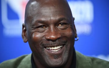 Former NBA star and owner of Charlotte Hornets team Michael Jordan looks on as he addresses a press conference ahead of the NBA basketball match between Milwakuee Bucks and Charlotte Hornets at The AccorHotels Arena in Paris on January 24, 2020. (Photo by FRANCK FIFE / AFP) (Photo by FRANCK FIFE/AFP via Getty Images)