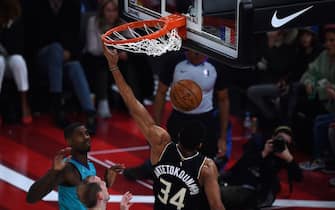 Milwaukee Bucks forward Giannis Antetokounmpo scores during the NBA basketball match between Milwakuee Bucks and Charlotte Hornets at The AccorHotels Arena in Paris on January 24, 2020. (Photo by FRANCK FIFE / AFP) (Photo by FRANCK FIFE/AFP via Getty Images)